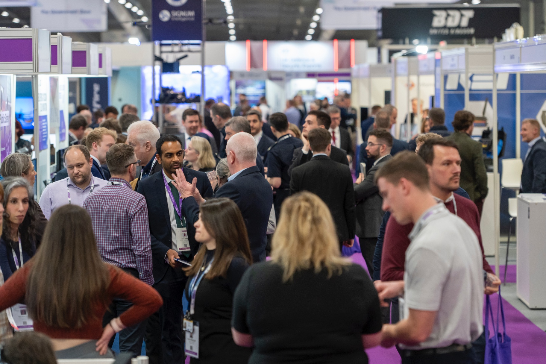 Visitors networking on the Security & Policing show floor
